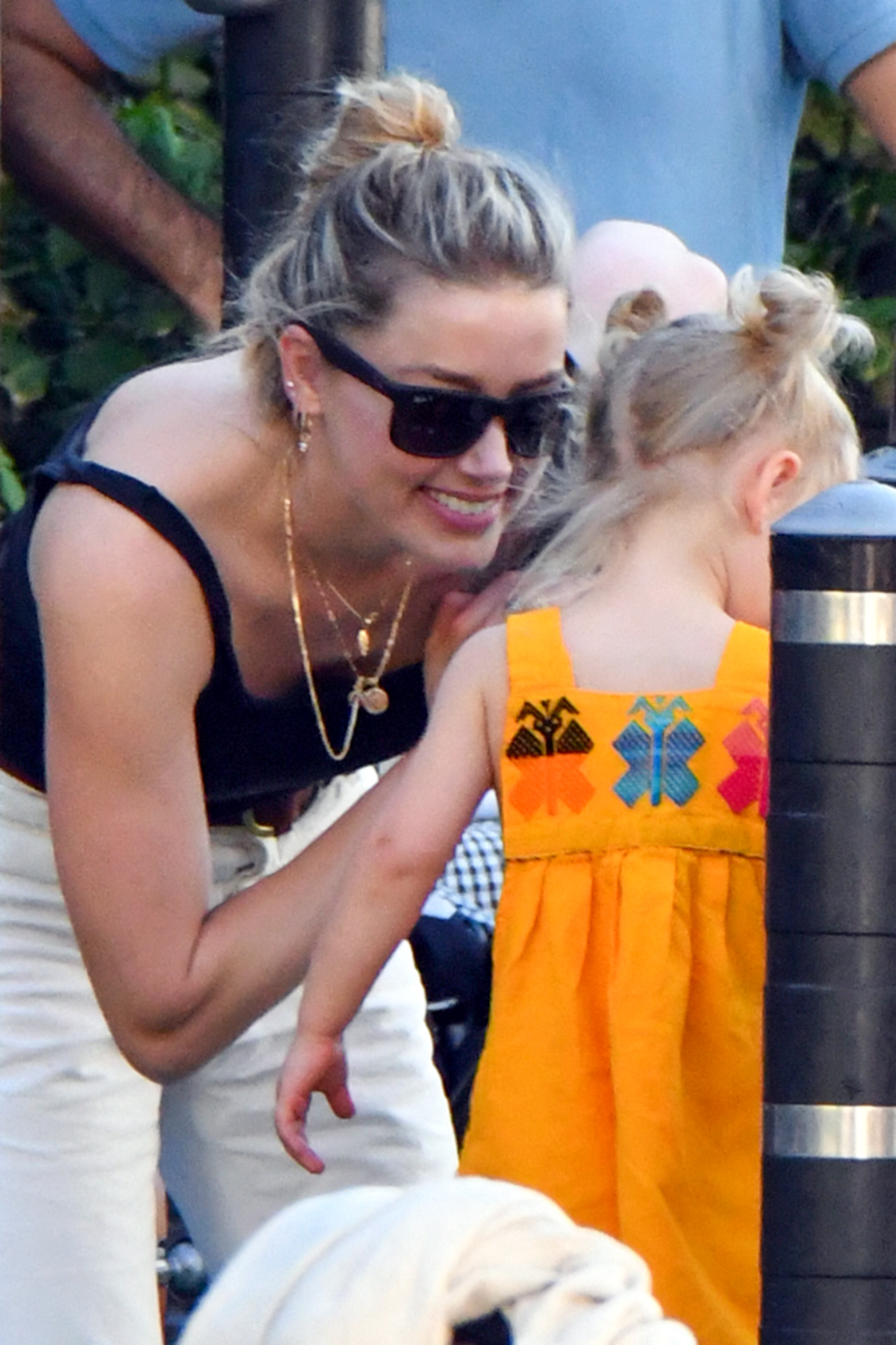 Amber Heard playing with her daughter