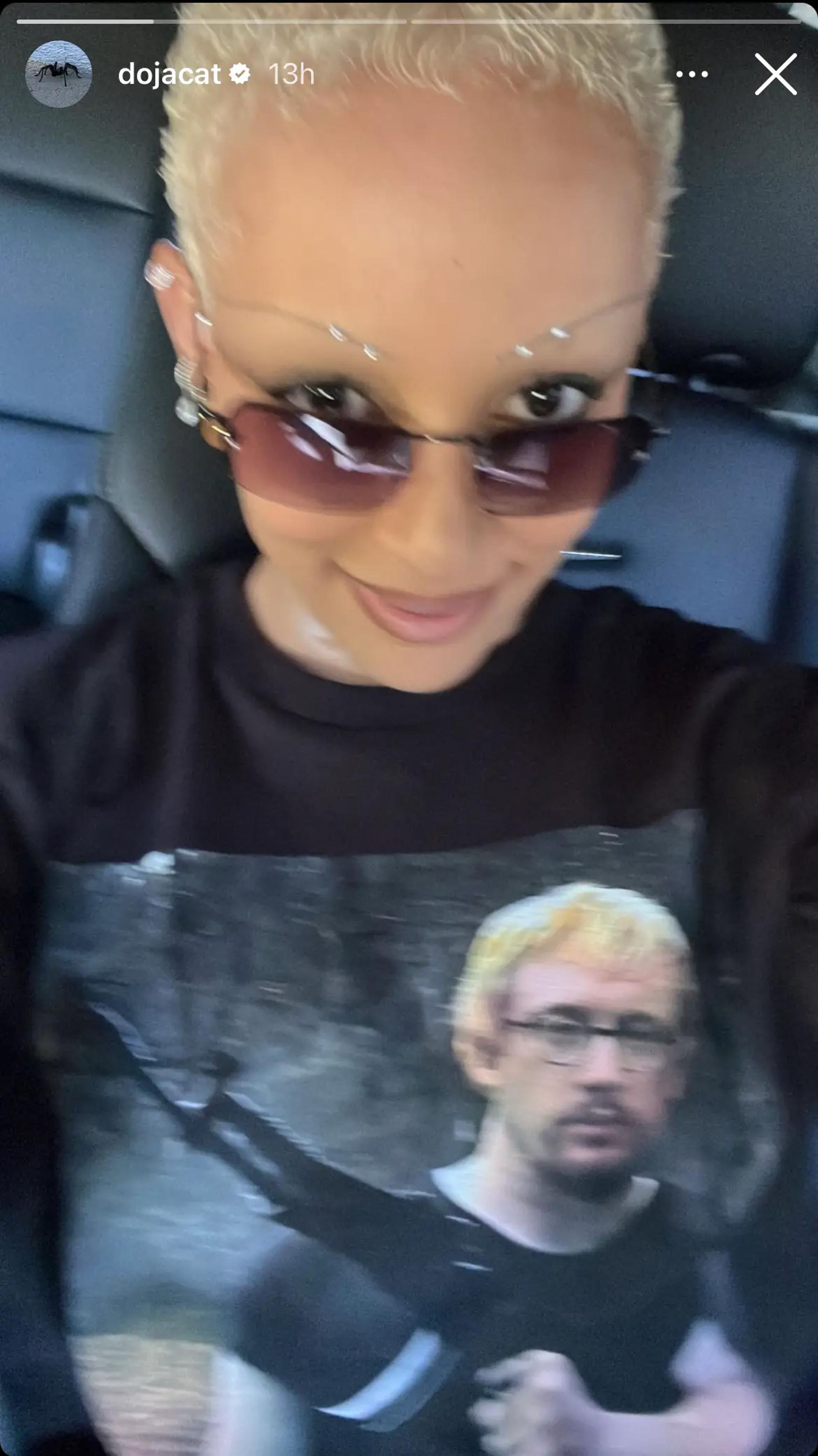 Doja Cat wearing a shirt with Sam Hyde's face on it.