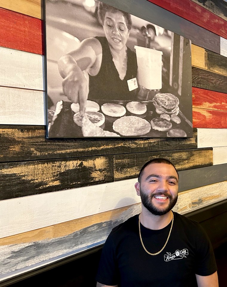 Image: Brandon Klinger at The Arepa Lady, with Maria Cano pictured in photo