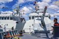 Two Chinese warships have made a first visit to a Cambodian naval base that Washington has long feared will boost Beijing's influence in the Gulf of Thailand.