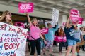 Abortion-rights protesters in front of the federal courthouse on May 3, 2022, in West Palm Beach, Fla.