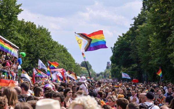 An intersex-inclusive Pride flag is waved during the annual Christopher Street Day parade on July 22, 2023 in Berlin, Germany.
